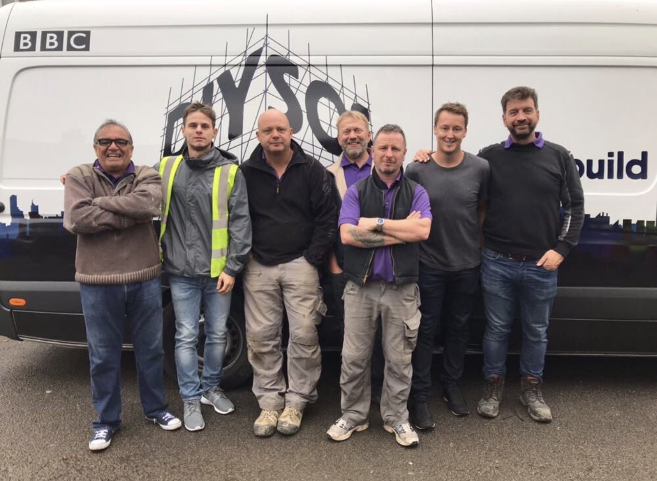 Green Roofers team pictured together outside the BBC DIY SOS van